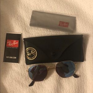 Never worn hexagonal blue tint Ray Bans.